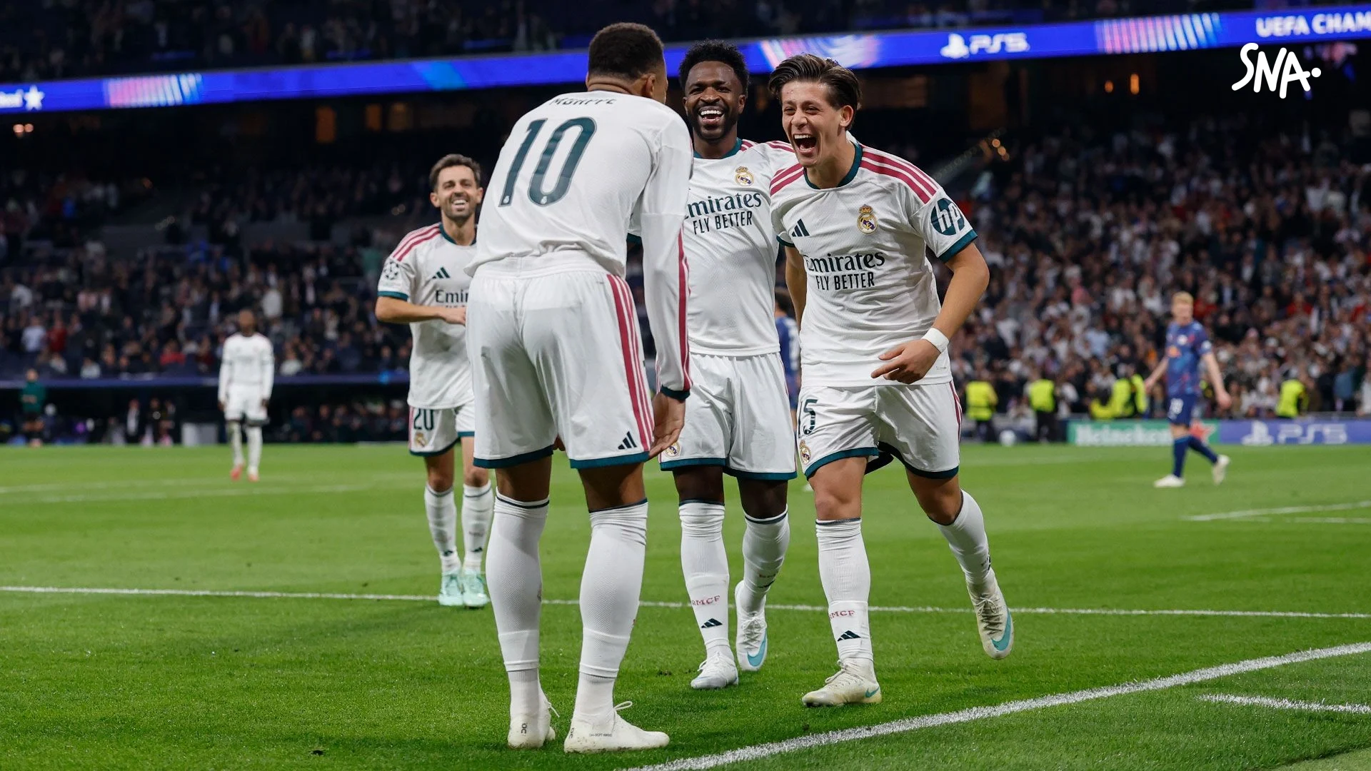 Arda Güler celebrates with Kylian Mbappé and Vinícius Júnior during Real Madrid–Leipzig on 21 October 2026.