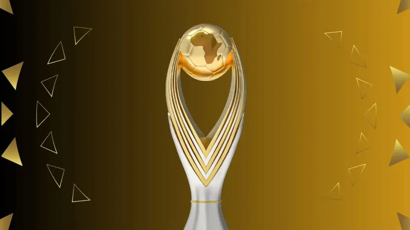 Illustration du trophée de la Ligue des champions de la CAF sur fond doré.