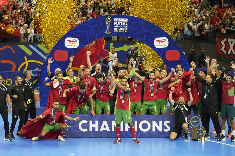 Morocco's national team celebrate their title as Africa futsal champions in Rabat on 21 October 2026.