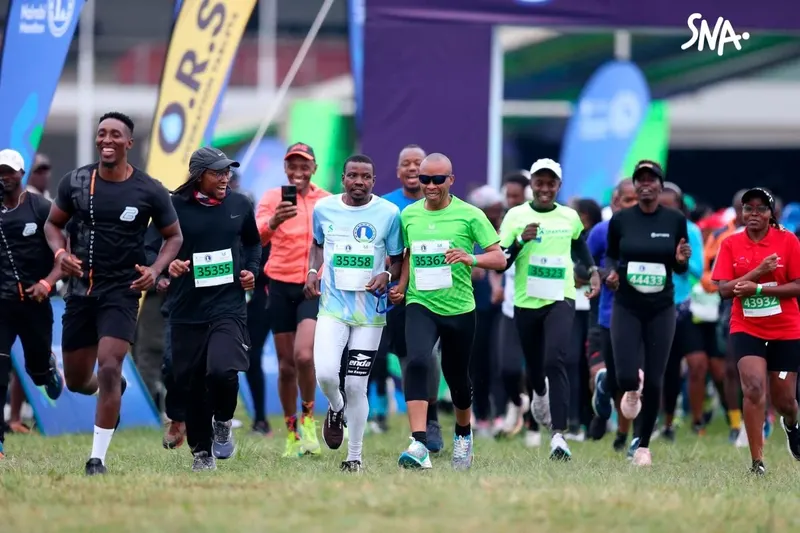 Henry Wanyoike, in green, and Peter Njenga at the launch of the Nairobi Marathon at Uhuru Gardens, on 15 July 2025 — file photo.