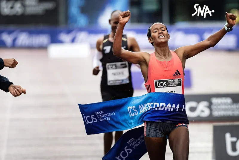 Buze Diriba at the finish of the Amsterdam Marathon on 18 October 2026.