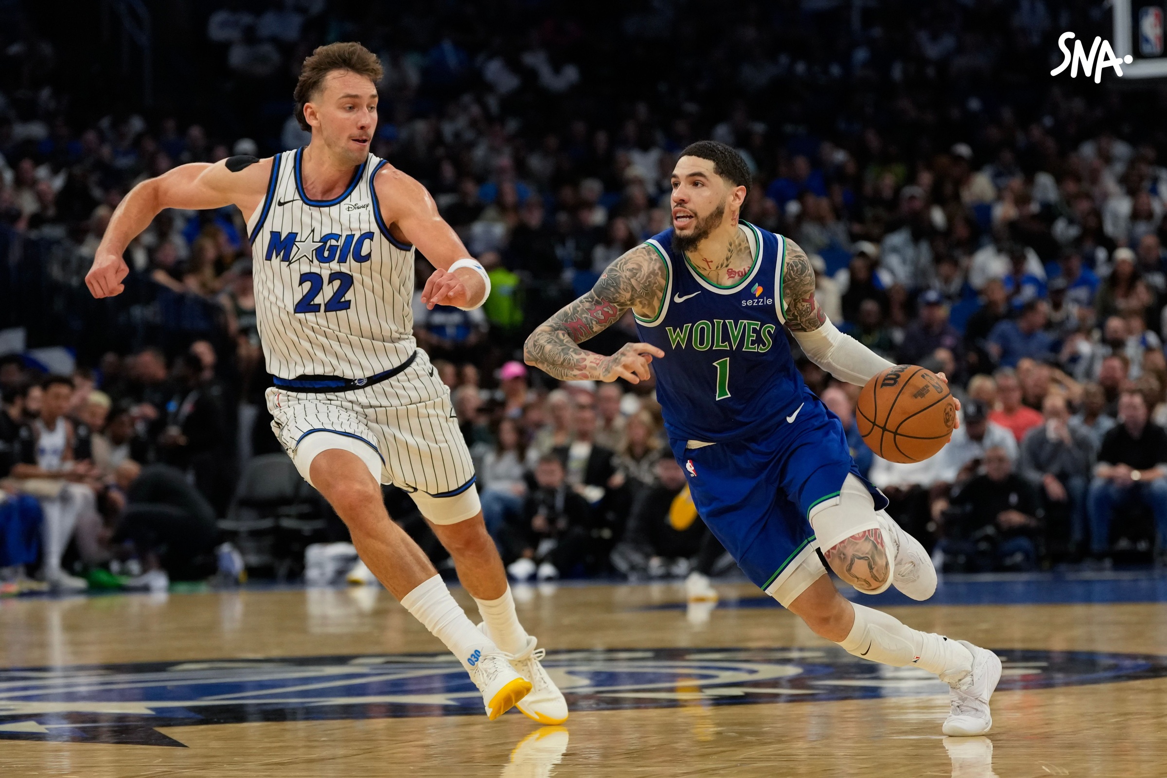 LaMelo Ball déborde Franz Wagner pendant Minnesota–Orlando, le 23 octobre 2026 à Orlando, en seconde mi-temps.