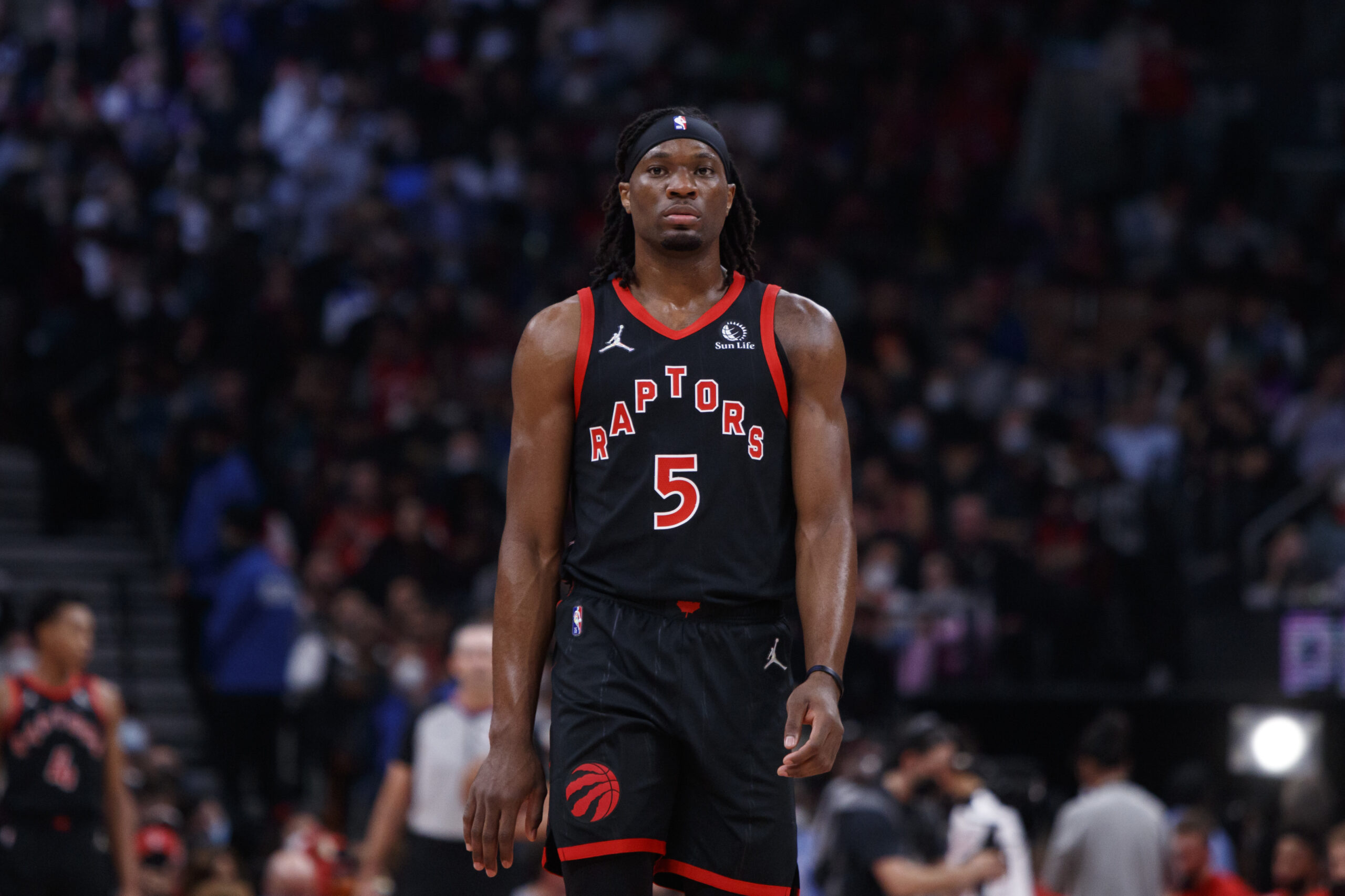 TORONTO, ON - OCTOBER 29: Precious Achiuwa #5 of the Toronto Raptors during the first half of their NBA game against the Orlando Magic at Scotiabank Arena on October 29, 2021 in Toronto, Canada. NOTE TO USER: User expressly acknowledges and agrees that, by downloading and or using this photograph, User is consenting to the terms and conditions of the Getty Images License Agreement.  (Photo by Cole Burston/Getty Images)