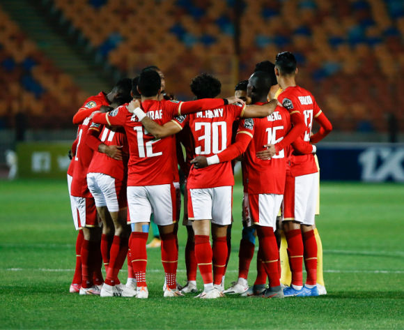 Al Ahly players huddle in group during the 2021 CAF Champions League football match between Al Ahly and AS Vita at the Cairo International Stadium in Cairo, Egypt on 06 March 2021 ©BackpagePix