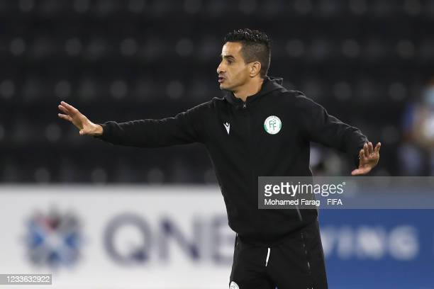DOHA, QATAR - JUNE 24:   Comoros Head Coach / Manager Younes Zerdouk reacts during the FIFA Arab Cup 2021 Qualifying match between Palestine and Comoros at Jassim Bin Hamad Stadium on June 24, 2021 in Doha, Qatar. (Photo by Mohamed Farag - FIFA/FIFA via Getty Images)