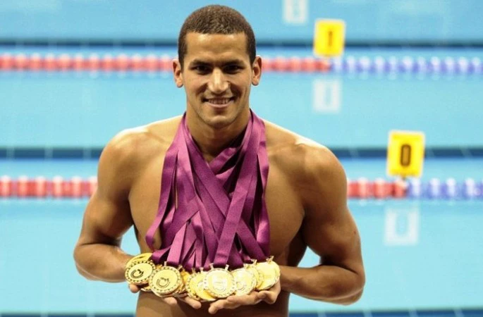 Oussama Mellouli avec sa médaille d'or olympique