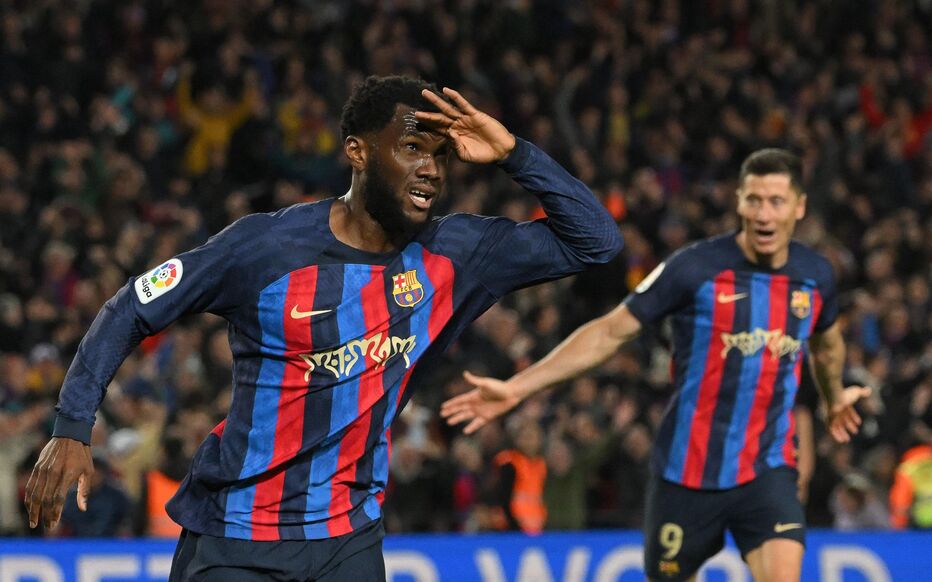 Barcelona's Ivorian midfielder Franck Kessie celebrates after scoring his team's second goal during the Spanish league football match between FC Barcelona and Real Madrid CF at the Camp Nou stadium in Barcelona on March 19, 2023. (Photo by LLUIS GENE / AFP)