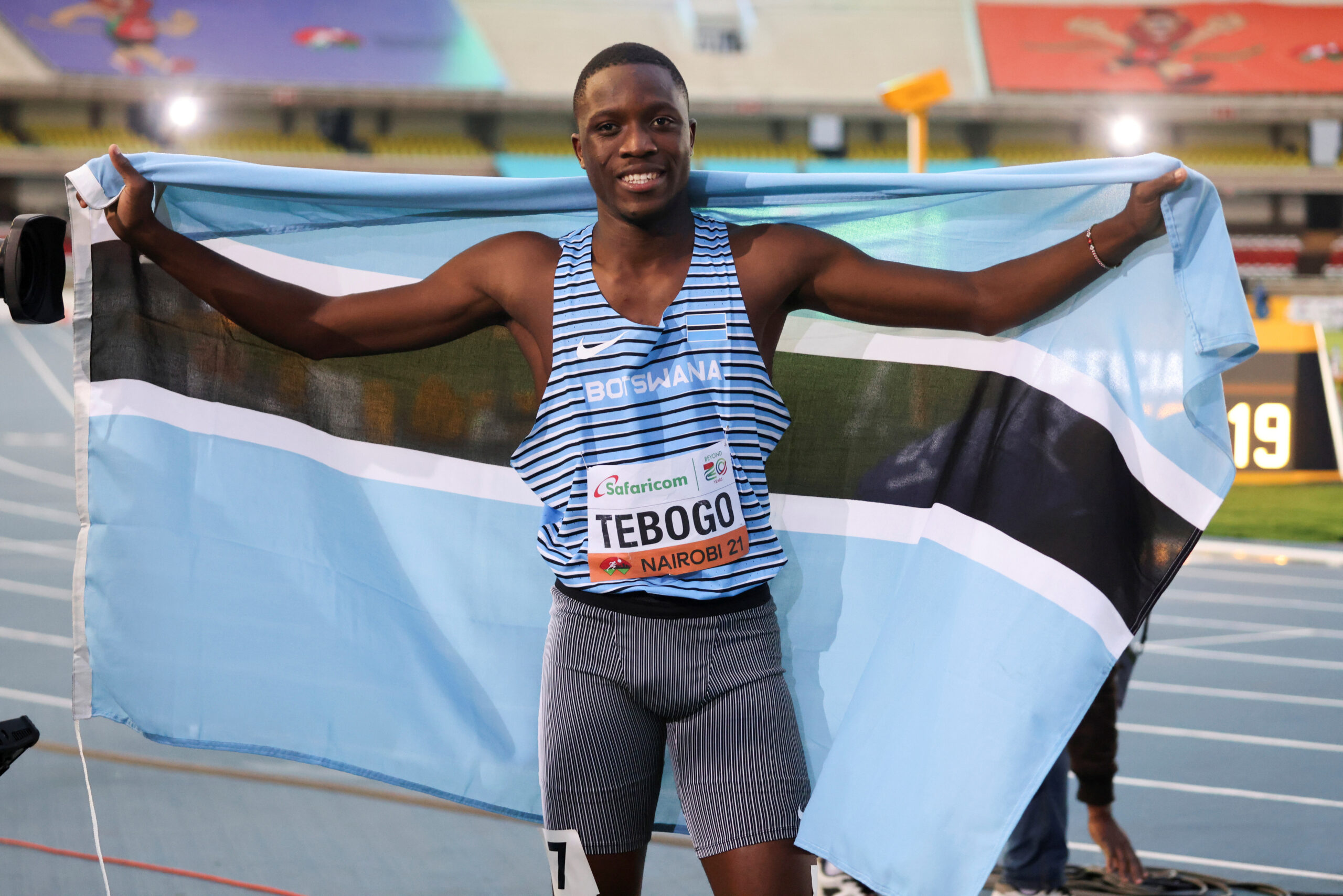 FILE PHOTO: Athletics - 2021 World Athletics U20 Championships - Botswana's Letsile Tebogo celebrates after winning gold at the Men's 100 meters final - Kasarani Stadium, Nairobi, Kenya - August 19, 2021.REUTERS/Baz Ratner