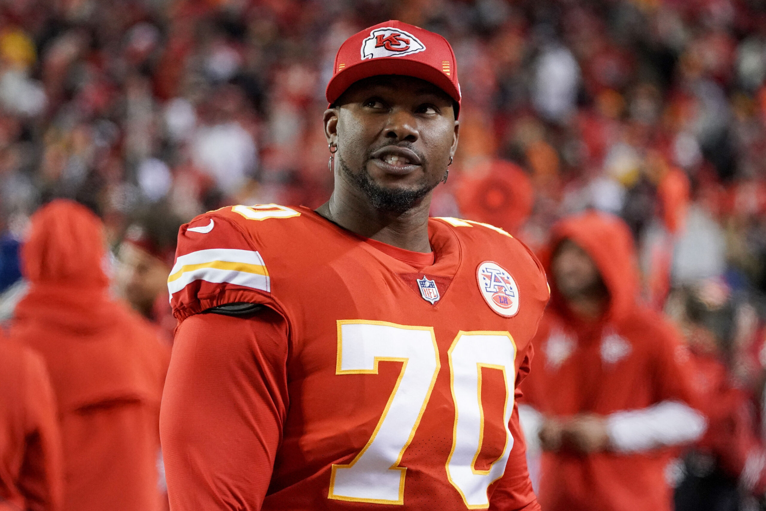 Dec 5, 2021; Kansas City, Missouri, USA; Kansas City Chiefs offensive tackle Prince Tega Wanogho (70) on the sidelines against the Denver Broncos during the game at GEHA Field at Arrowhead Stadium. Mandatory Credit: Denny Medley-USA TODAY Sports