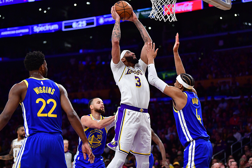 May 6, 2023; Los Angeles, California, USA; Los Angeles Lakers forward Anthony Davis (3) moves to the basket against Golden State Warriors guard Moses Moody (4) during the first half in game three of the 2023 NBA playoffs at Crypto.com Arena. Mandatory Credit: Gary A. Vasquez-USA TODAY Sports