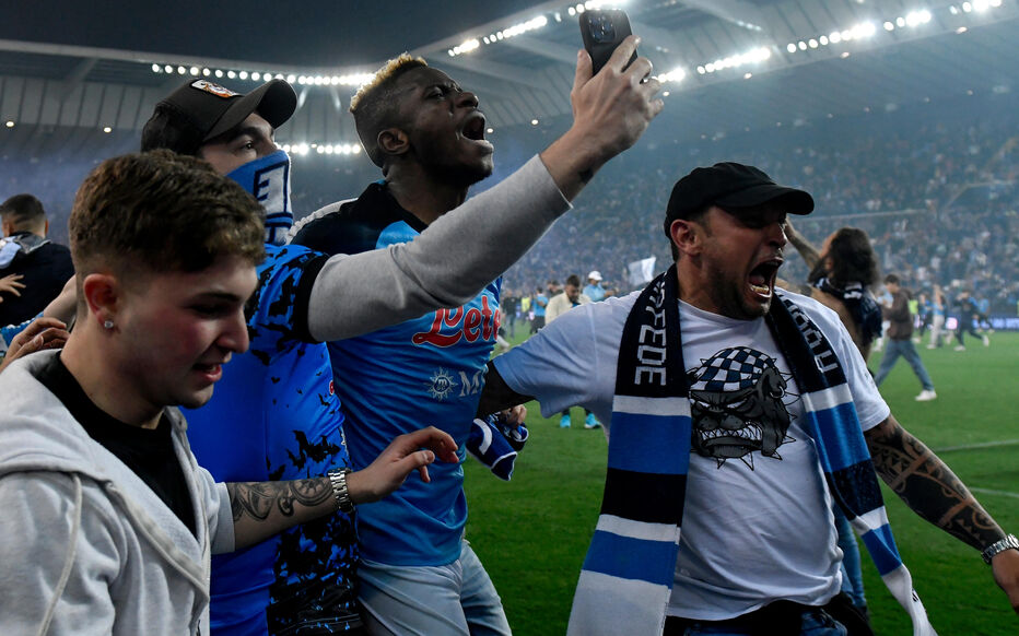 Victor Osimhen of SSC Napoli celebrates with fans at the end of the Serie A football match between Udinese Calcio and SSC Napoli at Friuli stadium in Udine (Italy), May 4th, 2023. Napoli is Italian champion for the third time in its history./Sipa USA No Sales in Italy - Photo by Icon sport