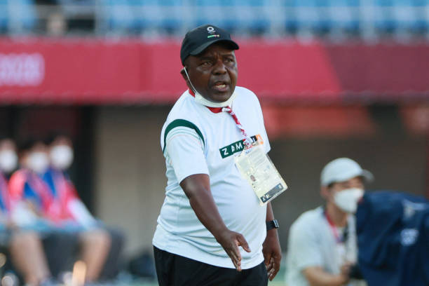 Zambia's coach Bruce Mwape speaks to his players during the Tokyo 2020 Olympic Games women's group F first round football match between China and Zambia at the Miyagi Stadium in Miyagi on July 24, 2021. (Photo by Kohei CHIBAHARA / AFP) (Photo by KOHEI CHIBAHARA/AFP via Getty Images)