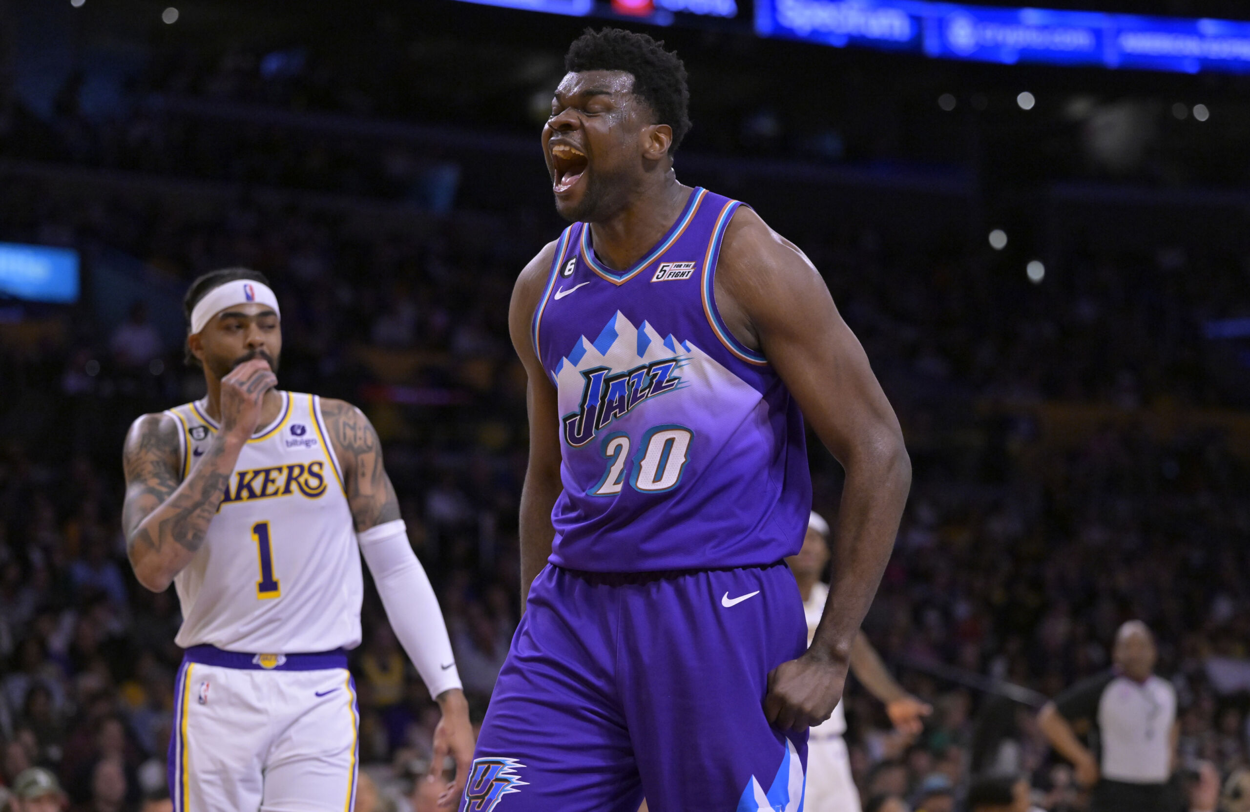 Apr 9, 2023; Los Angeles, California, USA; Utah Jazz center Udoka Azubuike (20) reacts after a dunk over Los Angeles Lakers forward Anthony Davis (3) in the first half at Crypto.com Arena. Mandatory Credit: Jayne Kamin-Oncea-USA TODAY Sports