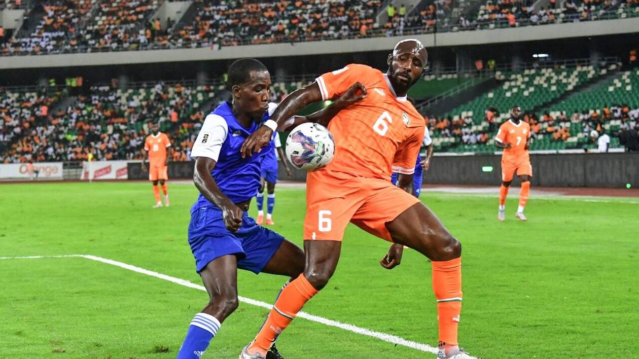 Ivory Coast's midfielder #6 Seko Fofana and Seychelles' midfielder #13 Kenan Nourice vie for the ball during the FIFA World Cup 2026 Africa qualifying match between Ivory Coast and Seychelles at the Olympic Stadium of Ebimpe, northern Abidjan, on November 17, 2023. (Photo by Sia KAMBOU / AFP)