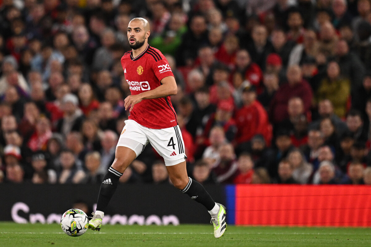 Manchester United's Moroccan midfielder #04 Sofyan Amrabat controls the ball during the English League Cup third round football match between Manchester United and Crystal Palace at Old Trafford in Manchester, north west England, on September 26, 2023. (Photo by Oli SCARFF / AFP) / RESTRICTED TO EDITORIAL USE. NO USE WITH UNAUTHORIZED AUDIO, VIDEO, DATA, FIXTURE LISTS, CLUB/LEAGUE LOGOS OR 'LIVE' SERVICES. ONLINE IN-MATCH USE LIMITED TO 120 IMAGES. AN ADDITIONAL 40 IMAGES MAY BE USED IN EXTRA TIME. NO VIDEO EMULATION. SOCIAL MEDIA IN-MATCH USE LIMITED TO 120 IMAGES. AN ADDITIONAL 40 IMAGES MAY BE USED IN EXTRA TIME. NO USE IN BETTING PUBLICATIONS, GAMES OR SINGLE CLUB/LEAGUE/PLAYER PUBLICATIONS. - RESTRICTED TO EDITORIAL USE. No use with unauthorized audio, video, data, fixture lists, club/league logos or 'live' services. Online in-match use limited to 120 images. An additional 40 images may be used in extra time. No video emulation. Social media in-match use limited to 120 images. An additional 40 images may be used in extra time. No use in betting publications, games or single club/league/player publications. /