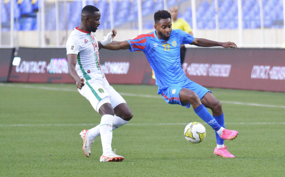 Cedric Bakambu of D.R. Congo challenged.by Yali Dellahi of Mauritania during the 2026 FIFA World Cup Qualifiers between D.R. Congo and Mauritania at Stade des Martyrs in Kinshasa, Democratic Republic of the Congo on 15 November 2023 - Photo by Icon sport