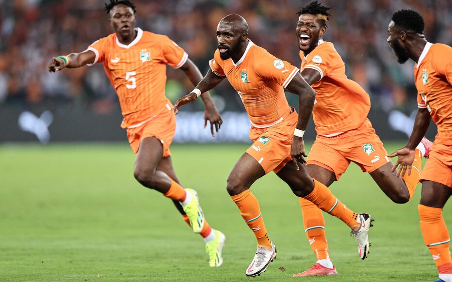 Ivory Coast's midfielder #6 Seko Fofana (C) celebrates scoring his team's first goal during the Africa Cup of Nations (CAN) 2024 group A football match between Ivory Coast and Guinea-Bissau at the Alassane Ouattara Olympic Stadium in Ebimpe, Abidjan, on January 13, 2024. (Photo by FRANCK FIFE / AFP)