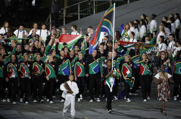 South Africa's Caster Semenya carries the flag during the Opening Ceremony at the 2012 Summer Olympics, Friday, July 27, 2012, in London. (AP Photo/Jae C. Hong)