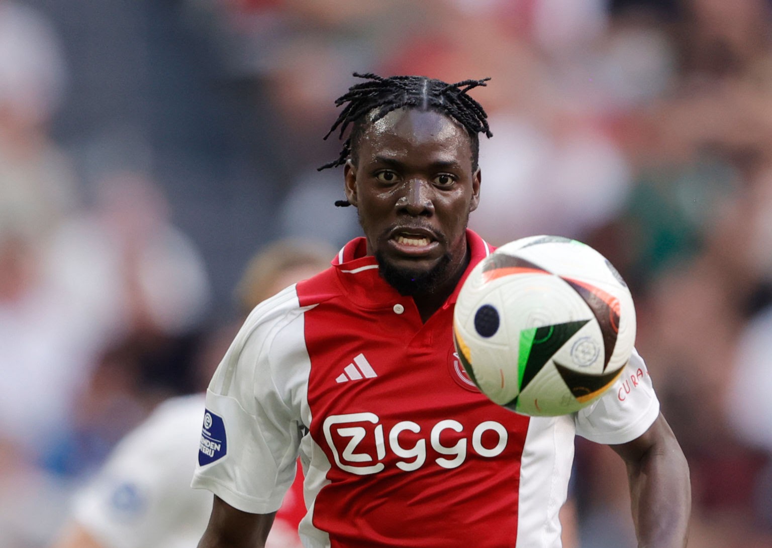 AMSTERDAM, NETHERLANDS - AUGUST 11: bertrand Traore of Ajax during the Dutch Eredivisie  match between Ajax v SC Heerenveen at the Johan Cruijff Arena on August 11, 2024 in Amsterdam Netherlands (Photo by Rico Brouwer/Soccrates/Getty Images)