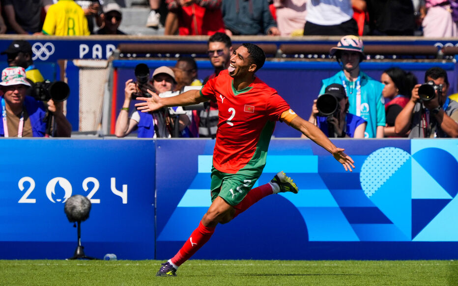 Aug 2, 2024; Paris, France; Morocco defender Achraf Hakimi (2) celebrates a goal against United States in a men's football quarterfinal during the Paris 2024 Olympic Summer Games at Parc des Princes. Mandatory Credit: Andrew P. Scott/USA TODAY Sports/Sipa USA Photo by Icon Sport