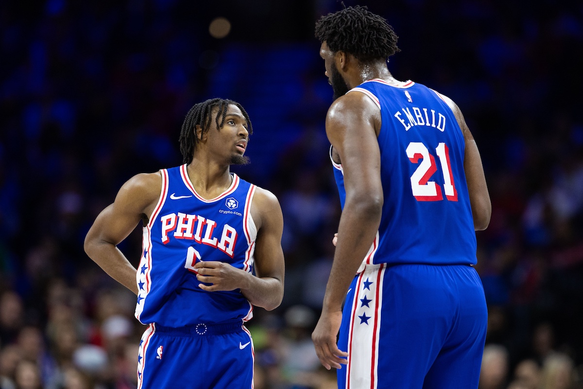 Jan 15, 2024; Philadelphia, Pennsylvania, USA; Philadelphia 76ers center Joel Embiid (21) and guard Tyrese Maxey (0) talk during a break in action in the first quarter against the Houston Rockets at Wells Fargo Center. Mandatory Credit: Bill Streicher-USA TODAY Sports